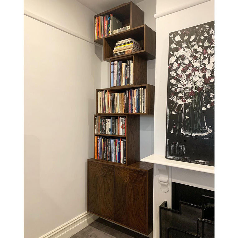 Stacked random Walnut shelving